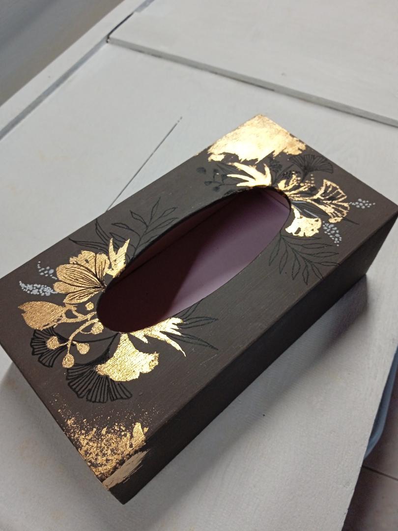 pose de feuilles d'or